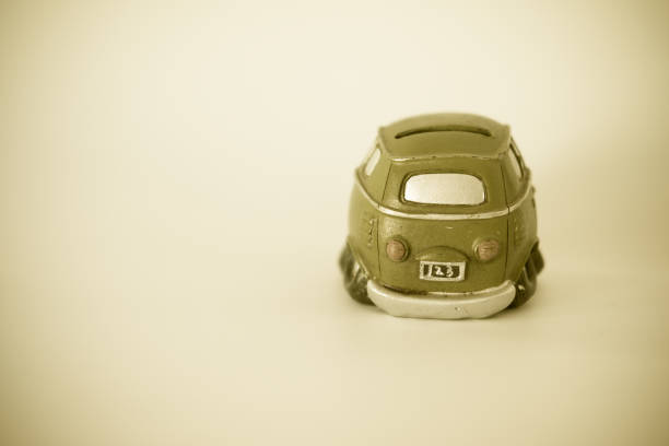 istock Retro fun toy car on white background 1197851693