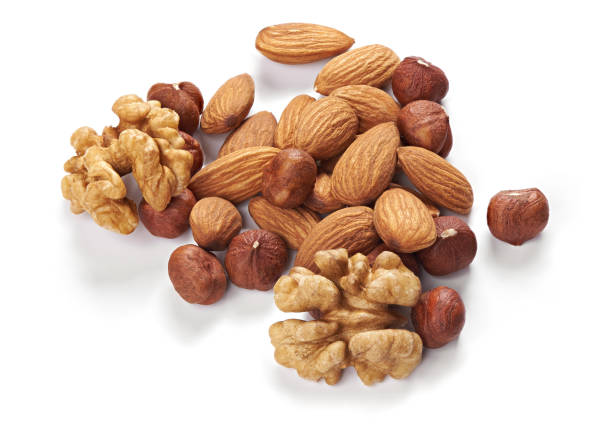 istock mix of nuts. hazelnuts, walnuts and almonds 1197852655