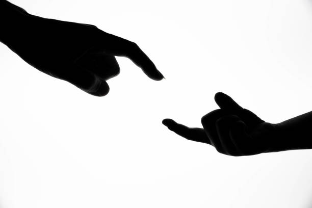 istock Mother and child shaking hands silhouette 1197854717