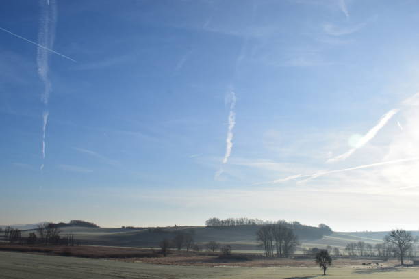 istock winter sun on icy Eifel morning 1197855651