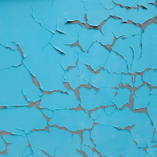 istock Blue wall texture with cracked old paint 1197856116