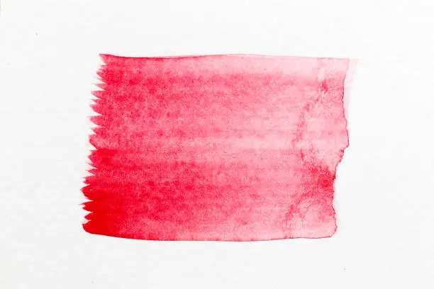 Red color watercolor handdrawing as line brush on white paper background