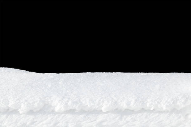 istock layer of fresh snow on a black background 1197866033