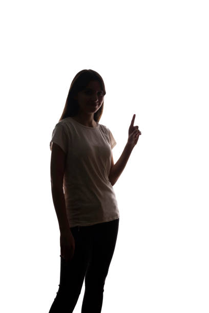 istock Young woman shows his index finger, hand forward 1197870585