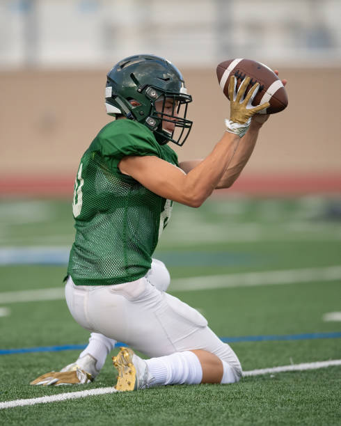 istock Young Football Player in Action During a Game 1197871923