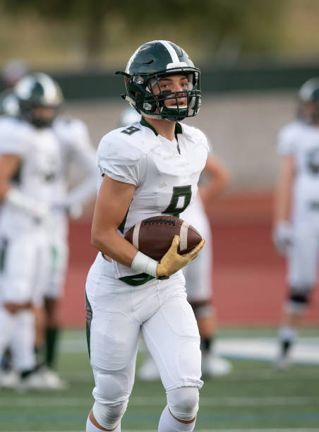 istock Young Football Player in Action During a Game 1197875953