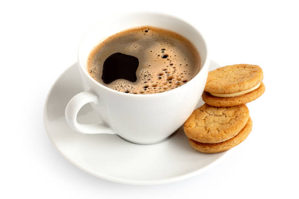 istock Cup of black coffee with biscuits. 1197876289