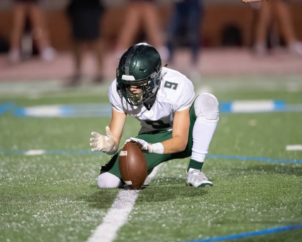 istock Young Football Player in Action During a Game 1197876462