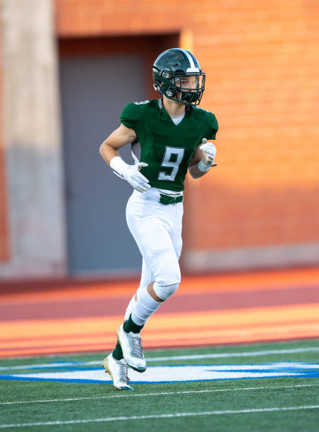 istock Young Football Player in Action During a Game 1197877322