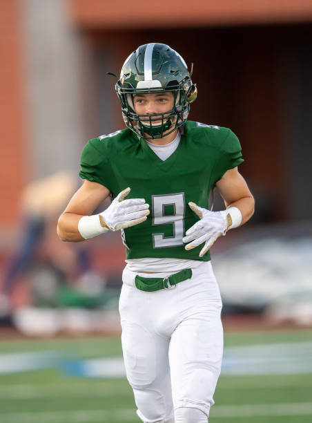 istock Young Football Player in Action During a Game 1197877330