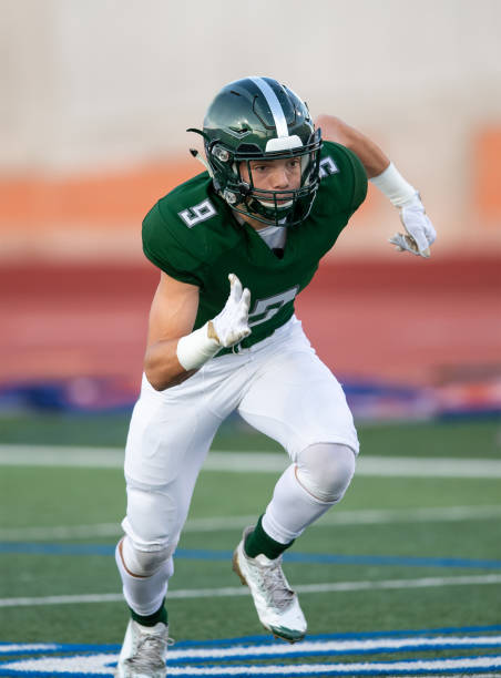 istock Young Football Player in Action During a Game 1197877349
