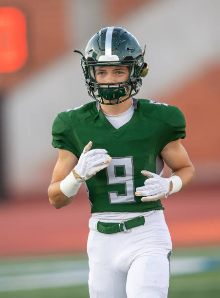 istock Young Football Player in Action During a Game 1197877354