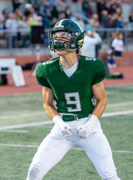 istock Young Football Player in Action During a Game 1197877364