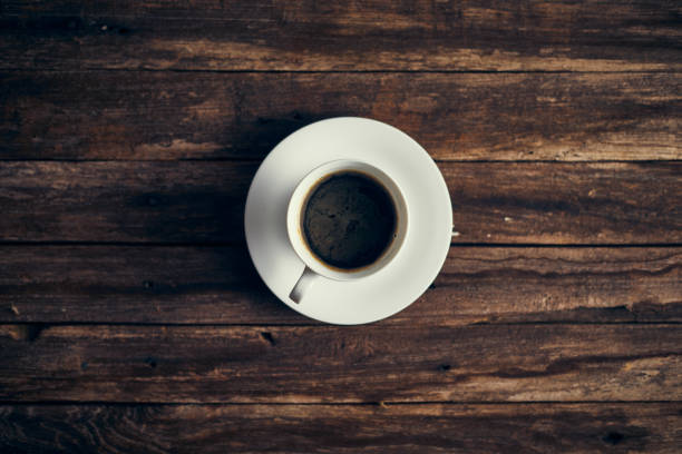 istock Top view of coffee cup on background. 1197877414