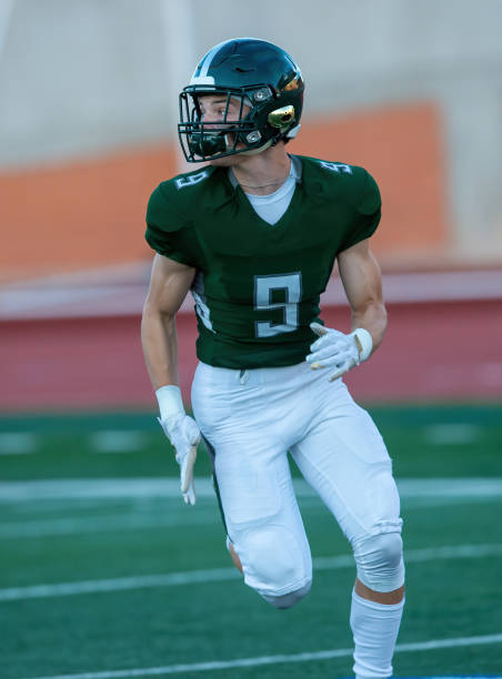 istock Young Football Player in Action During a Game 1197879900