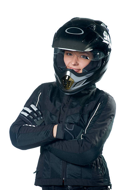 belleza joven mujer posando en moto de ropa y casco - motorcycle women helmet sensuality fotografías e imágenes de stock
