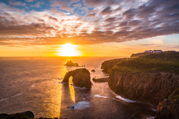 istock Dramatic sky at sunset with Enys Dodnan and the Armed Knight rock formations at Lands End 1197883910