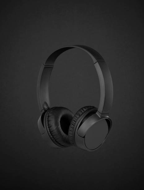 istock Headphones on black background 1197887062