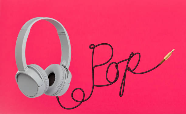 istock Headphones with pop cable pink wallpaper 1197887125