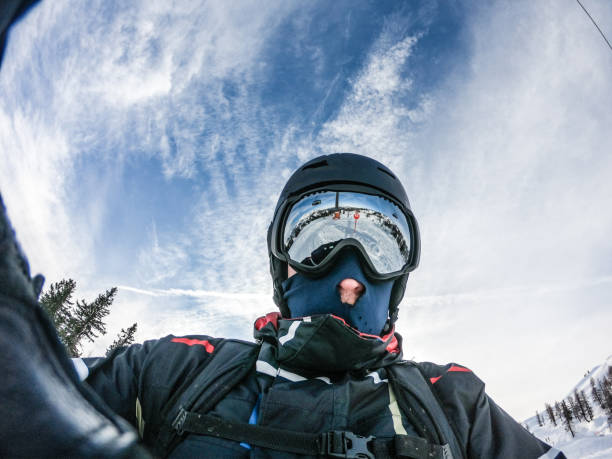 istock Man Snowboarding Portrait 1197889637