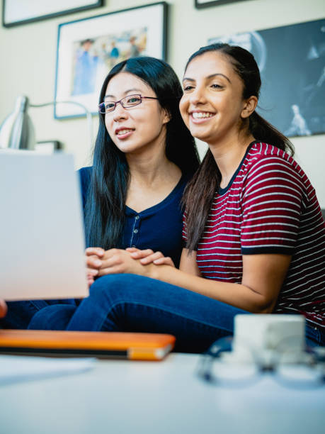 istock Financial advisor talking to Lesbian couple 1197891454