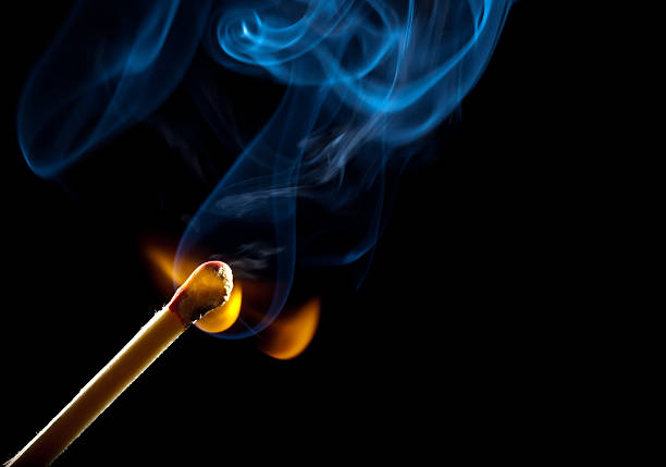 istock Ignition of match with smoke 119789344