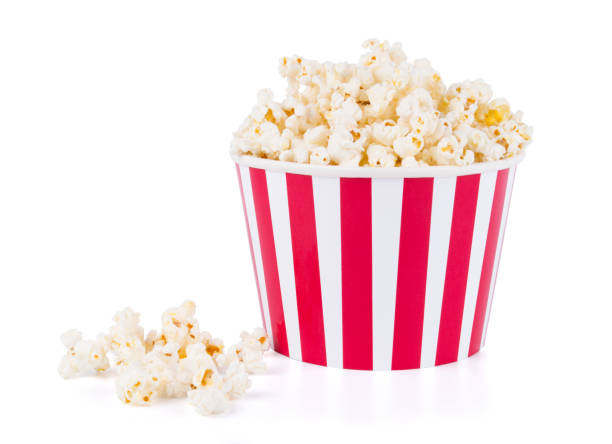 istock Popcorn in red and white cardboard box for cinema isolated on white background 1197894706