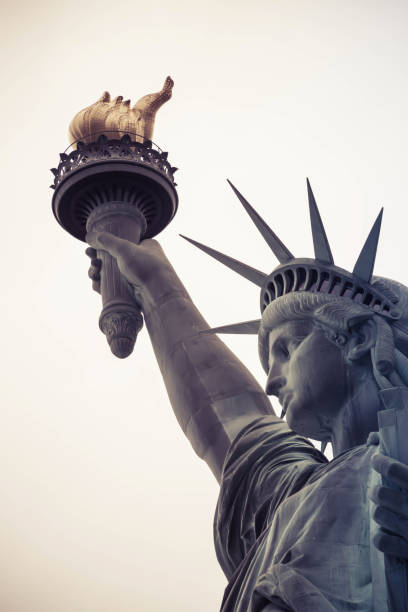 istock Looking up at the Statute of Liberty 1197895420