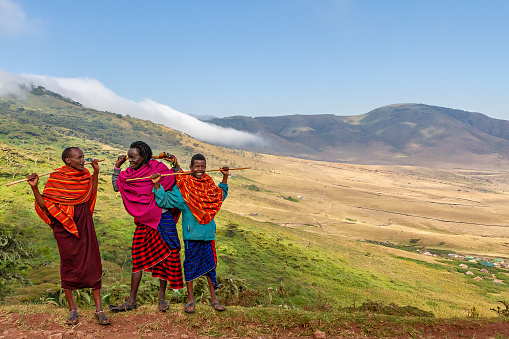 Ngorongoro, Tanzania - July 5, 2019: Maasai herders near Ngorongoro Crater, Ngorongoro, Tanzania