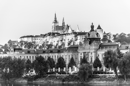 Prague Castle, seat of the President, and Straka Academy, seat of the Government, Prague, Czech Republic. Evening photography. Black and white image.