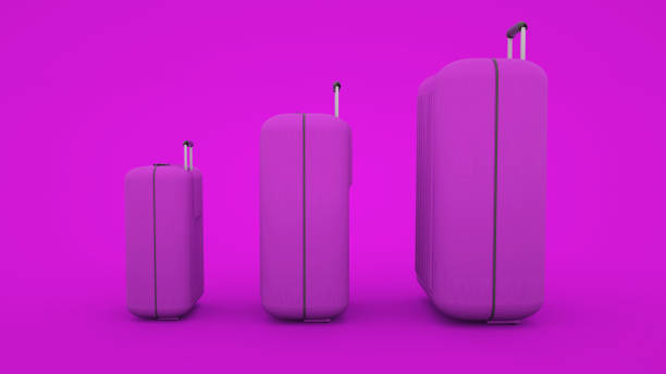 istock Three suitcases isolated on pink background, 3d illustration 1197913470