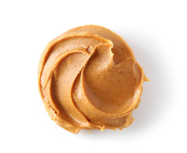 peanut butter isolated on white background, top view - peanut butter imagens e fotografias de stock