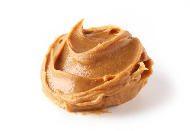 istock peanut butter isolated on white background 1197919587