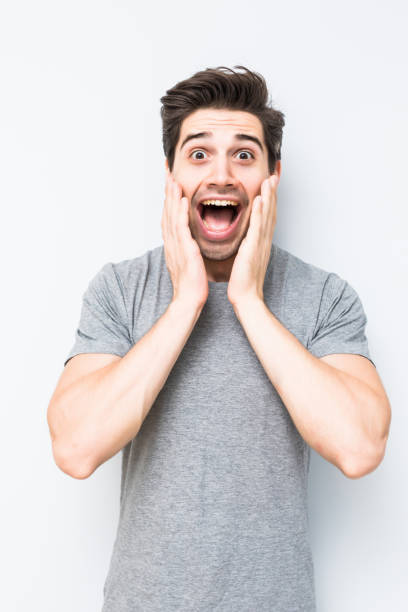istock Portrait of a man screaming isolated on white background 1197919622