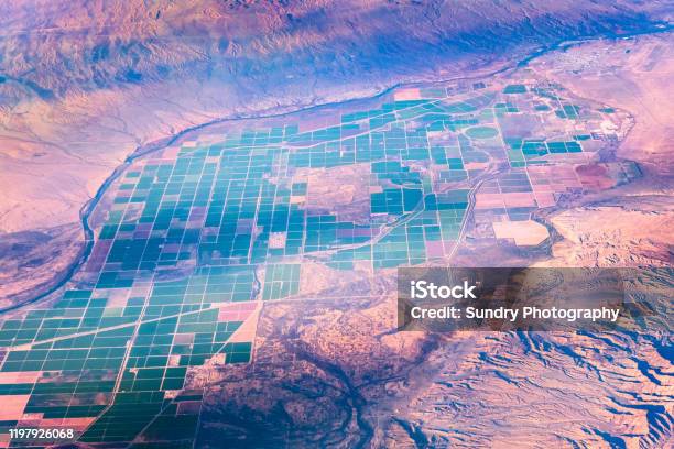 Aerial View Of Agricultural Fields On The Colorado River Valley In Arizona At The Border With California The City Of Parker Visible In The Right Upper Corner Stock Photo - Download Image Now