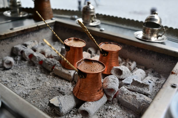 Turkish coffees are cooking on embers.