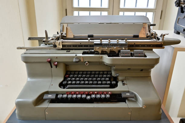 istock Vintage electro mechanical typewriter and calculator 1197927093