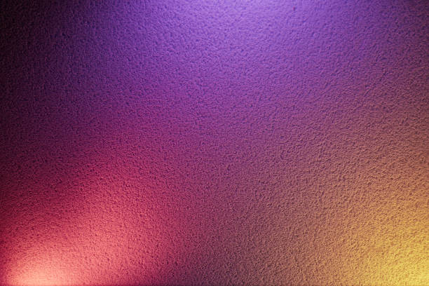 istock Pink and yellow patches on purple background 1197928323