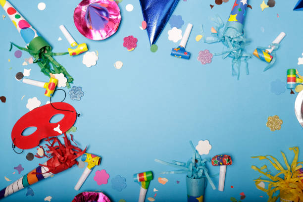 istock Confetti and hats for the carnival party 1197930219