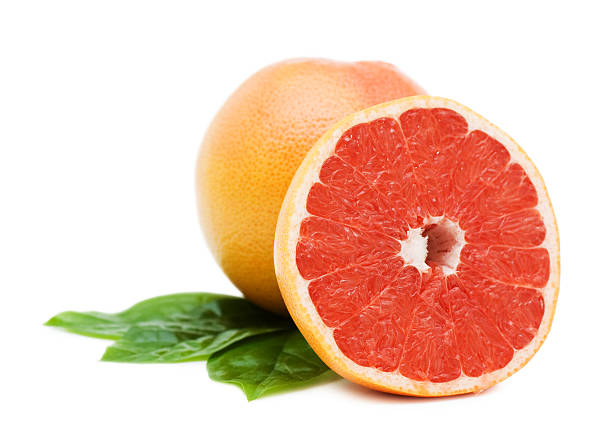 istock Fresh juicy grapefruits with green leafs 119793186