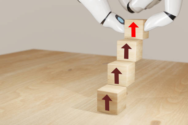 istock 3d rendering artificial intelligence robot hand flip the growth wooden cube concept to make growth in business 1197932354