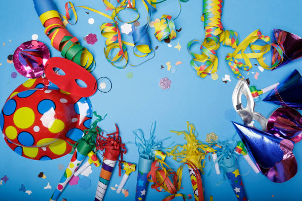 istock Confetti and hats for the carnival party 1197932375