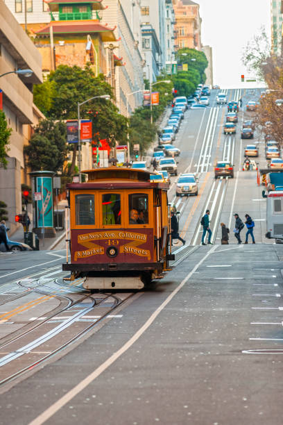 San Francisco, United states of america - december 16: Passengers enjoy a ride in a cable car on Dec 16, 2013 in San Francisco. It is the oldest mechanical public transport in San Francisco which is in service since 1873.