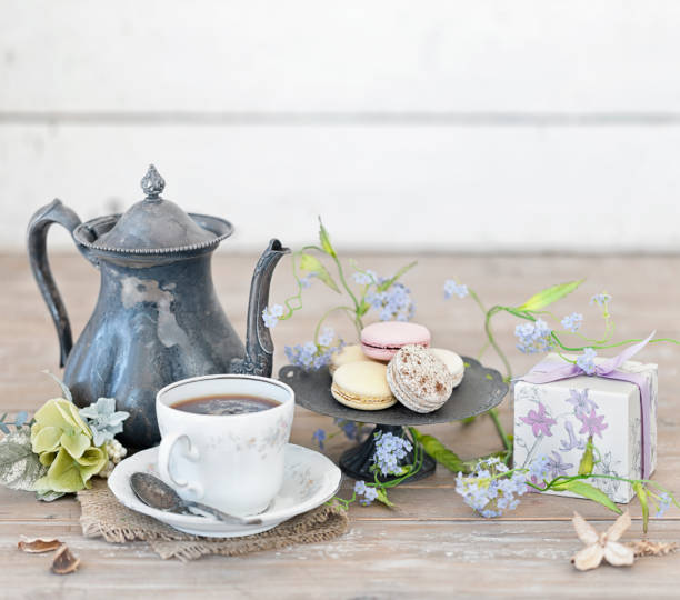 istock Vintage Mother's Day Tea on an Old Rustic White Wood Background 1197946321