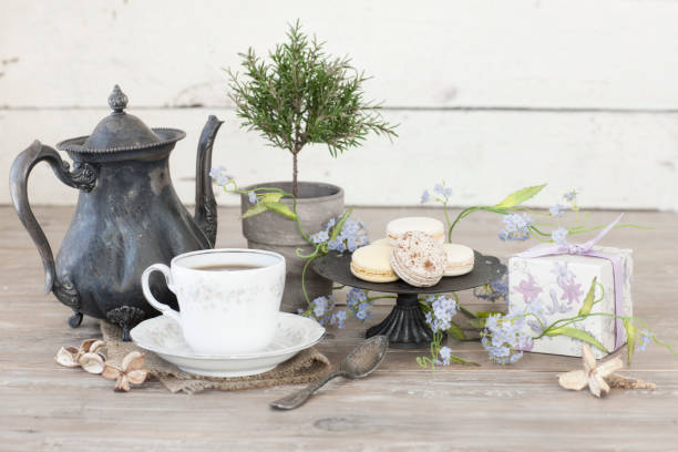 istock Vintage Mother's Day Tea on an Old Rustic White Wood Background 1197946353