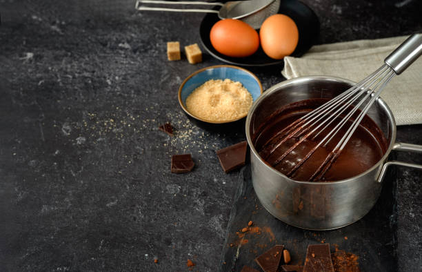 istock A pot with hot chocolate on dark background 1197947014