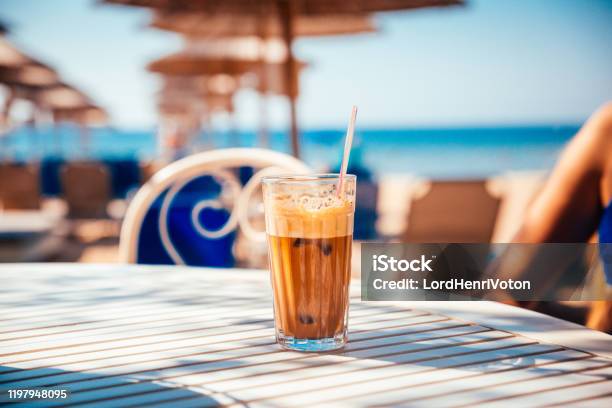 Coffee Frappe On Table Stock Photo - Download Image Now - Beach, Table, Iced Coffee