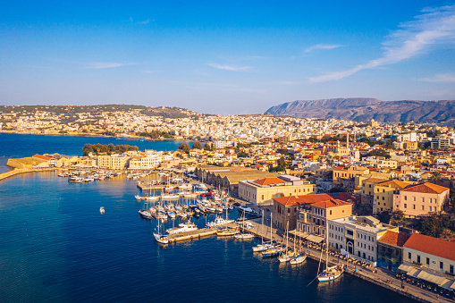 Picturesque old port of Chania. Landmarks of Crete island. Greece. Aerial view of the beautiful city of Chania with it's old harbor and the famous lighthouse, Crete, Greece.