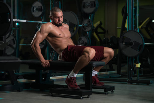 istock Attractive Young Man Resting In Gym Afther Exercise 1197953608