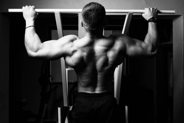 istock Muscular Man Doing Heavy Weight Exercise For Back 1197953928